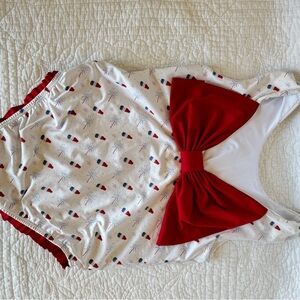 White Swimsuit with Red Bow and Firework Print